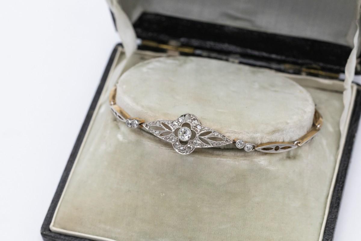 Women's or Men's Gold and platinum bracelet with old cut diamonds, circa 1920. For Sale