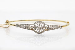 Gold- und Platinarmband mit Altschliffdiamanten, um 1920.