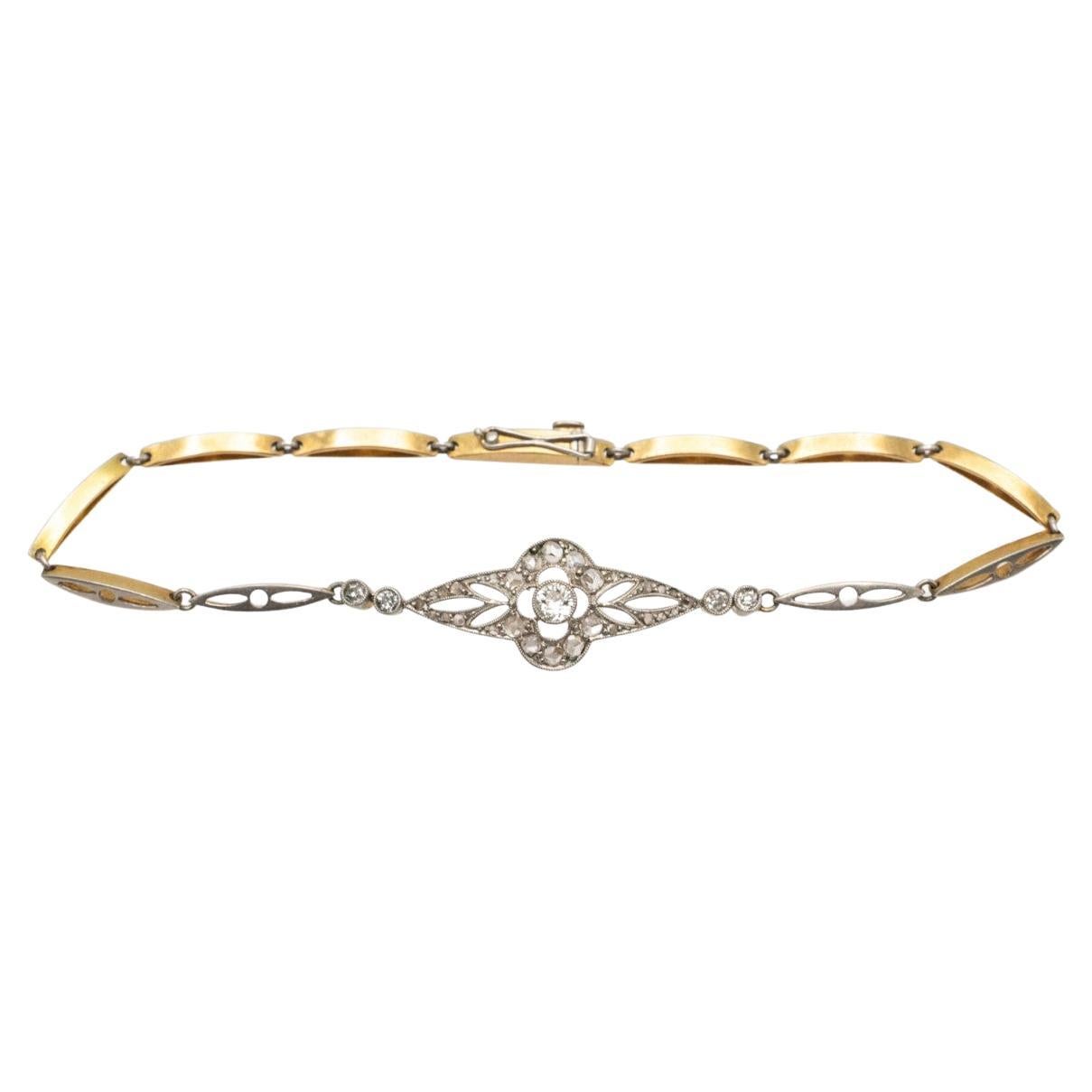 Gold and platinum bracelet with old cut diamonds, circa 1920.