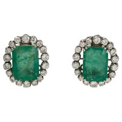 Gold and platinum earrings with emeralds and brilliants
