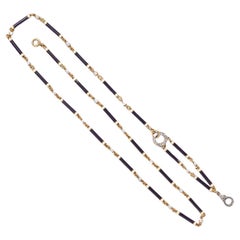 Gold and Platinum Necklace with pearls and enamel and diamonds