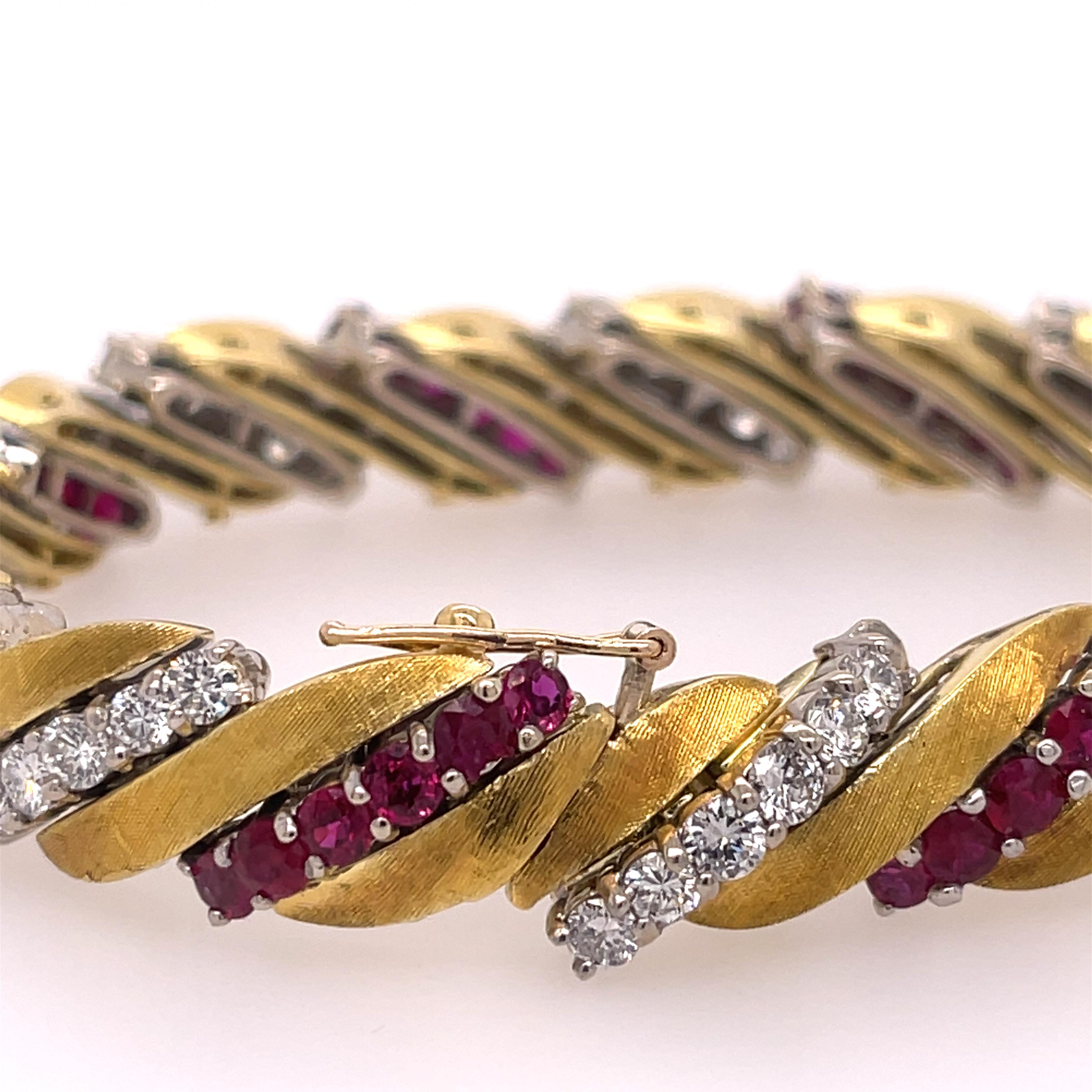 Ruby and diamond bracelet set in platinum and 18k yellow gold. There is approximately 6ctw of rubies and 6ctw of diamonds. The bracelet is 7 inches in length. 