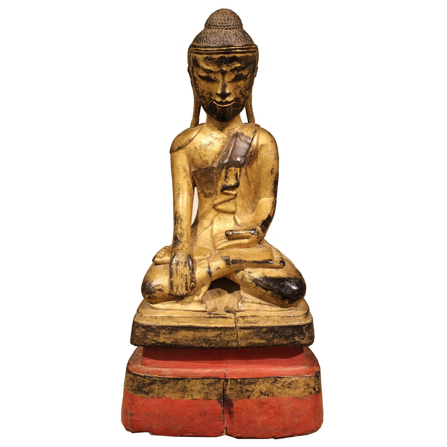 Gold and Red Sitting Monk