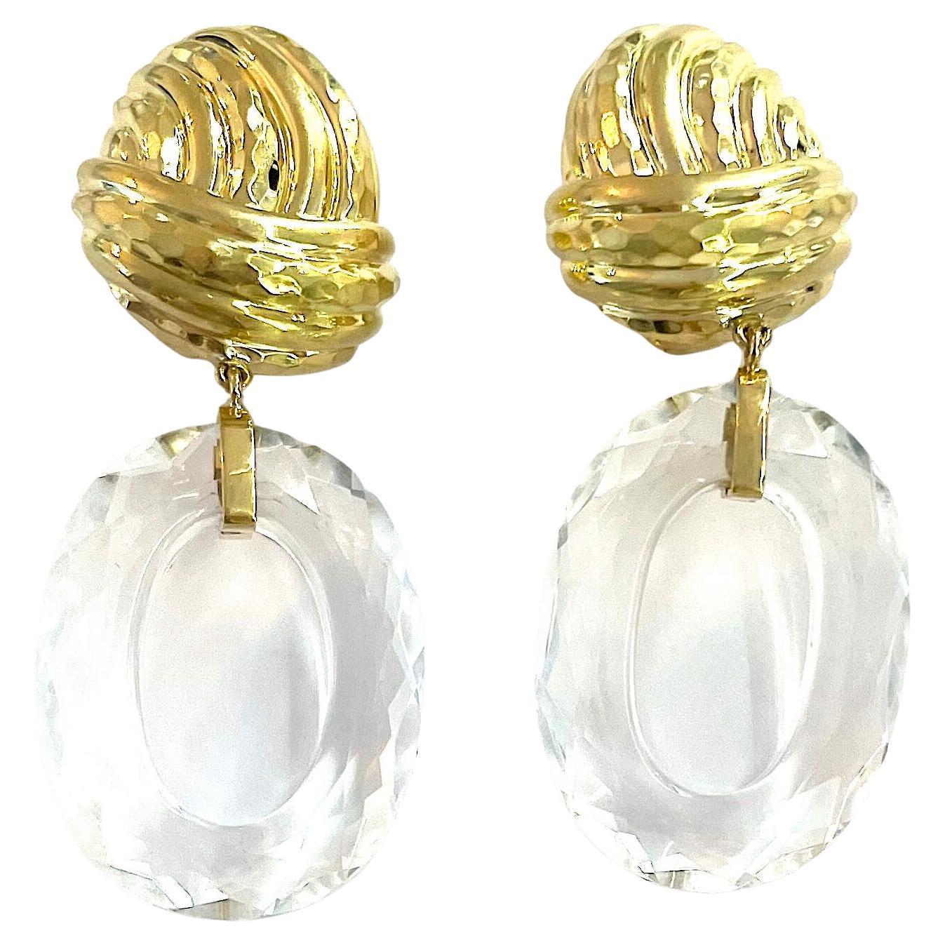 18kt Yellow Gold and Rock Crystal Hoop Drop Ear Clips signed A. Clunn

Elegant Ear clips in the style of David Webb from one of his most famous apprentices Andrew Clunn.

The Earrings measure approximately 2