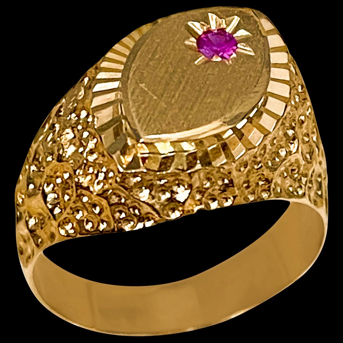 Gold And Ruby 14 Karat Yellow Gold Ring Size 9.5
14 K Yellow Gold: 6.5  gram

Ring Size 9.5 ( can be altered for no charge )
Ruby : One  tiny Ruby approximately 0.20 ct
Vintage value plus great craftsman ship on gold part of the ring
this ring is on