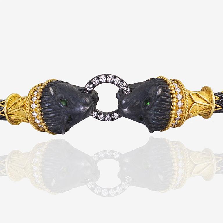 Completely handcrafted, 24K gold and silver combination Lion head bracelet by Serhat Design's experienced craftsmen. This bracelet exudes effortless beauty and captures the spirit of the royal women of all times. It's inspired from the art of