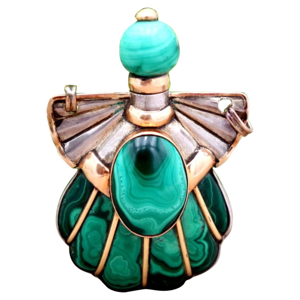 Gold and silver perfume bottle with reliefs For Sale