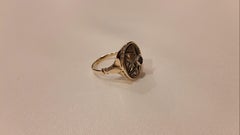 Gold and Silver Ring with Diamond and Sapphire Rosettes from the Early 1900s