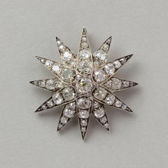 Broche étoile en or et argent avec diamants