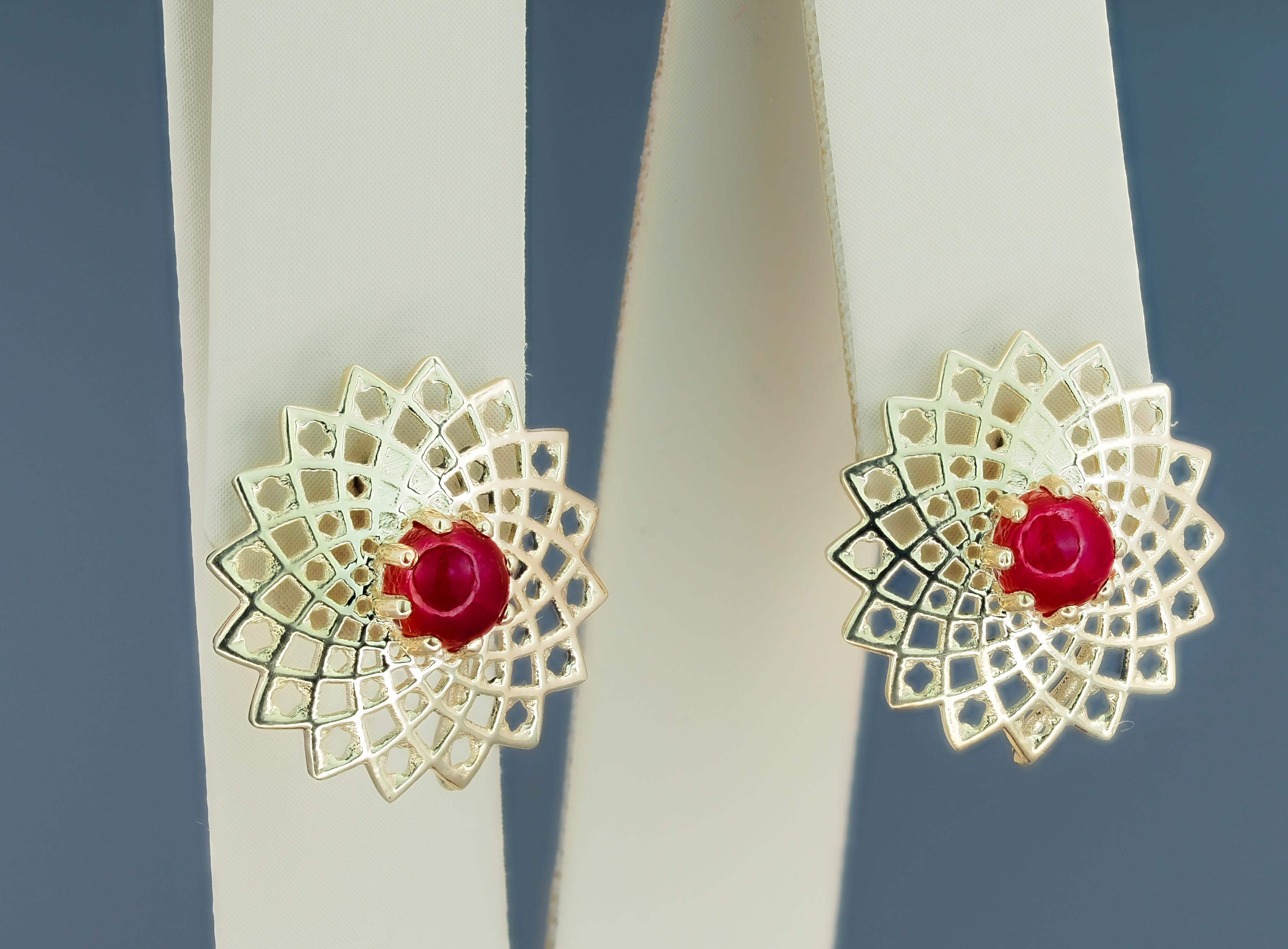 Modern Ruby earrings. Gold and Silver Transformable Earrings Studs with Rubies For Sale