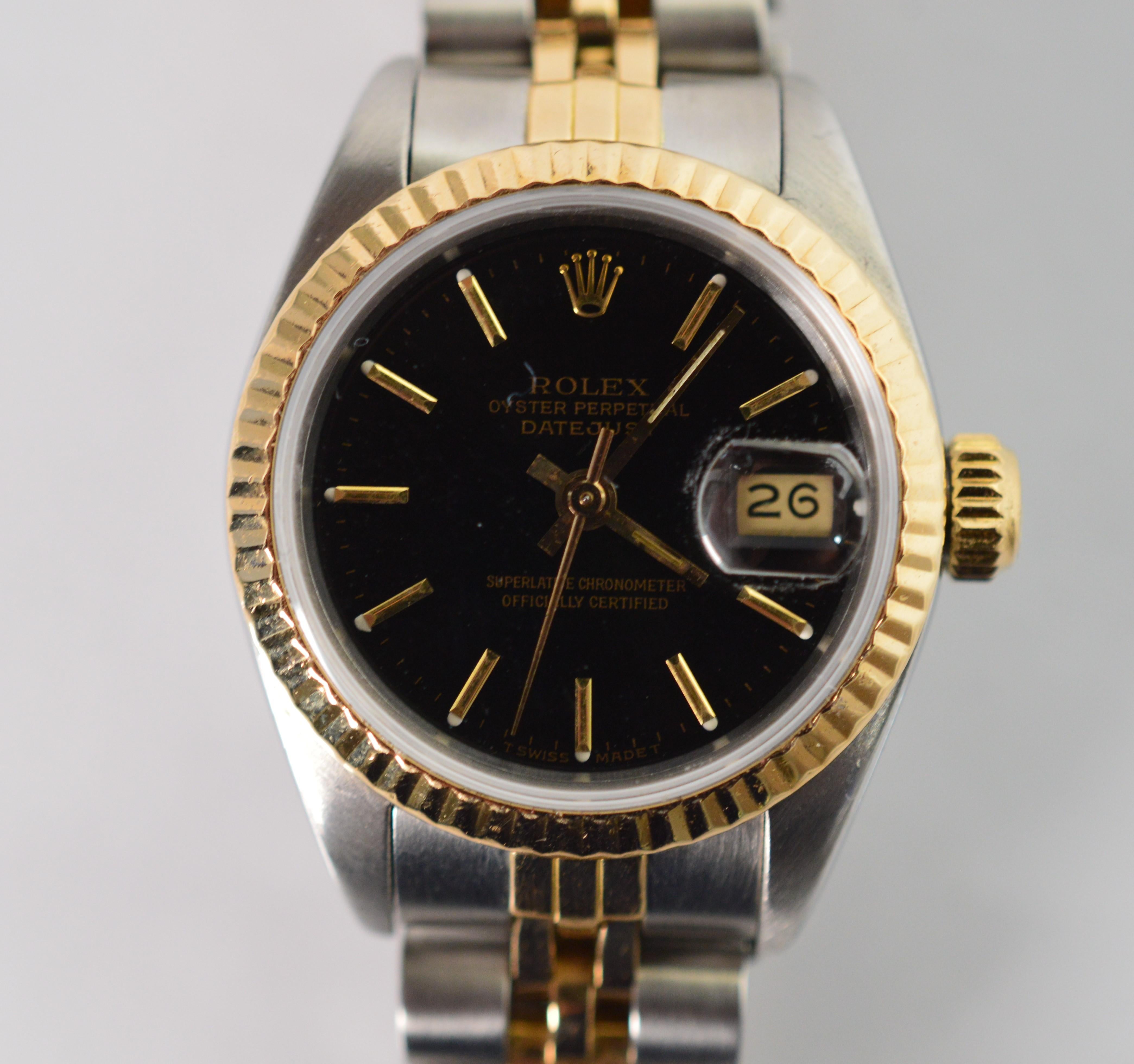 The Rolex Datejust watch model 69173 has a sophisticated look with two tone styling pairing stainless steel with eighteen karat yellow gold creating a a lustrous finish both affordable and appropriate for everyday as a luxury wrist watch that can