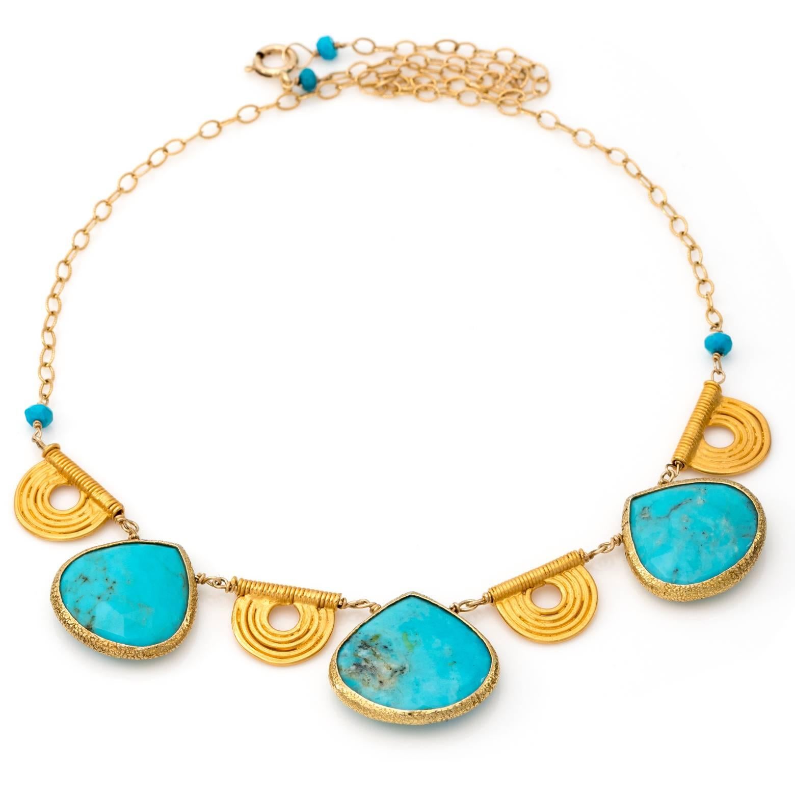 This is a beautifully designed Urban and Modern Tribal Necklace of 22k heavy gold vermeil and Persian Turquoise. The chain is gold filled and can be adjusted in length. This is the perfect necklace for Spring and Summer!!