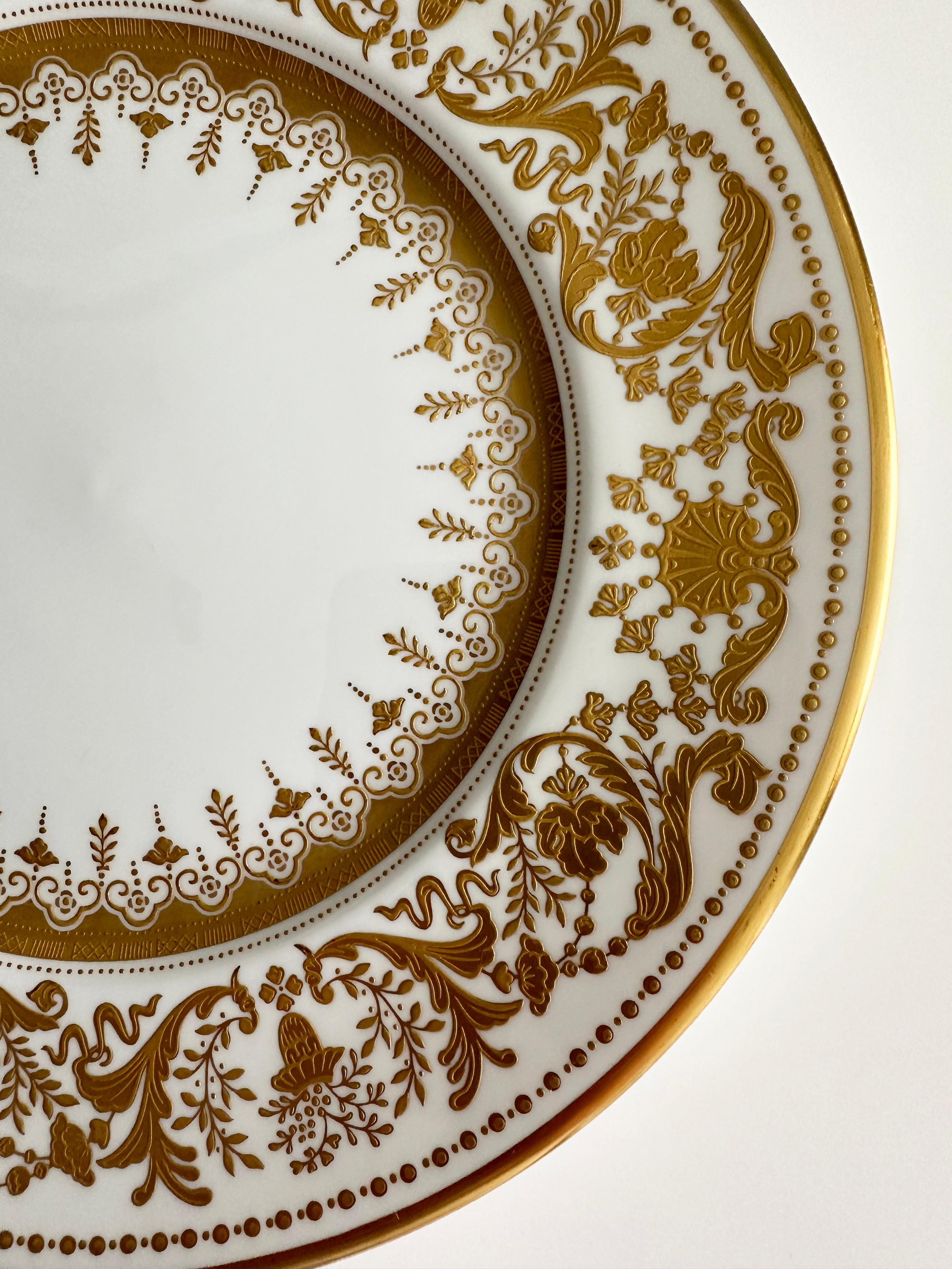Gold and Gold and White Decorative Porcelain Plate in Barocco Style by De Lamerie
Fine bone china with hand engraving, 22K gold plated, Made in England

Decorative plate, handmade in De Lameire factory, England as custom made order. Fine bone china.