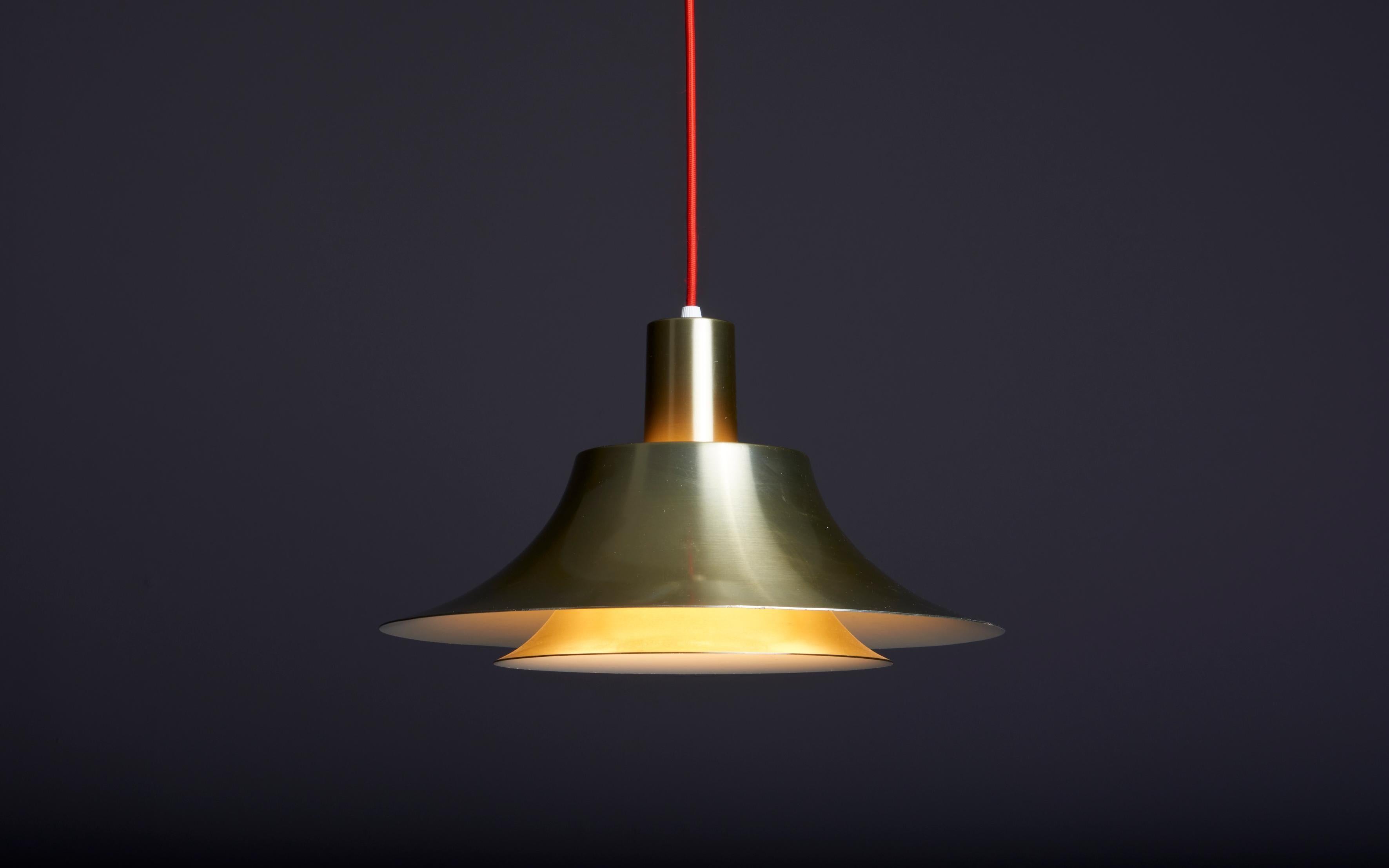 Pendant lamp in gold anodized aluminum and plexiglass, 1970s. Socket: 1 x E27. 

Please note: Lamp should be fitted professionally in accordance to local requirements.