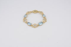 Gold-Aquamarin-Armband - 4×5 ct, mittelblau
