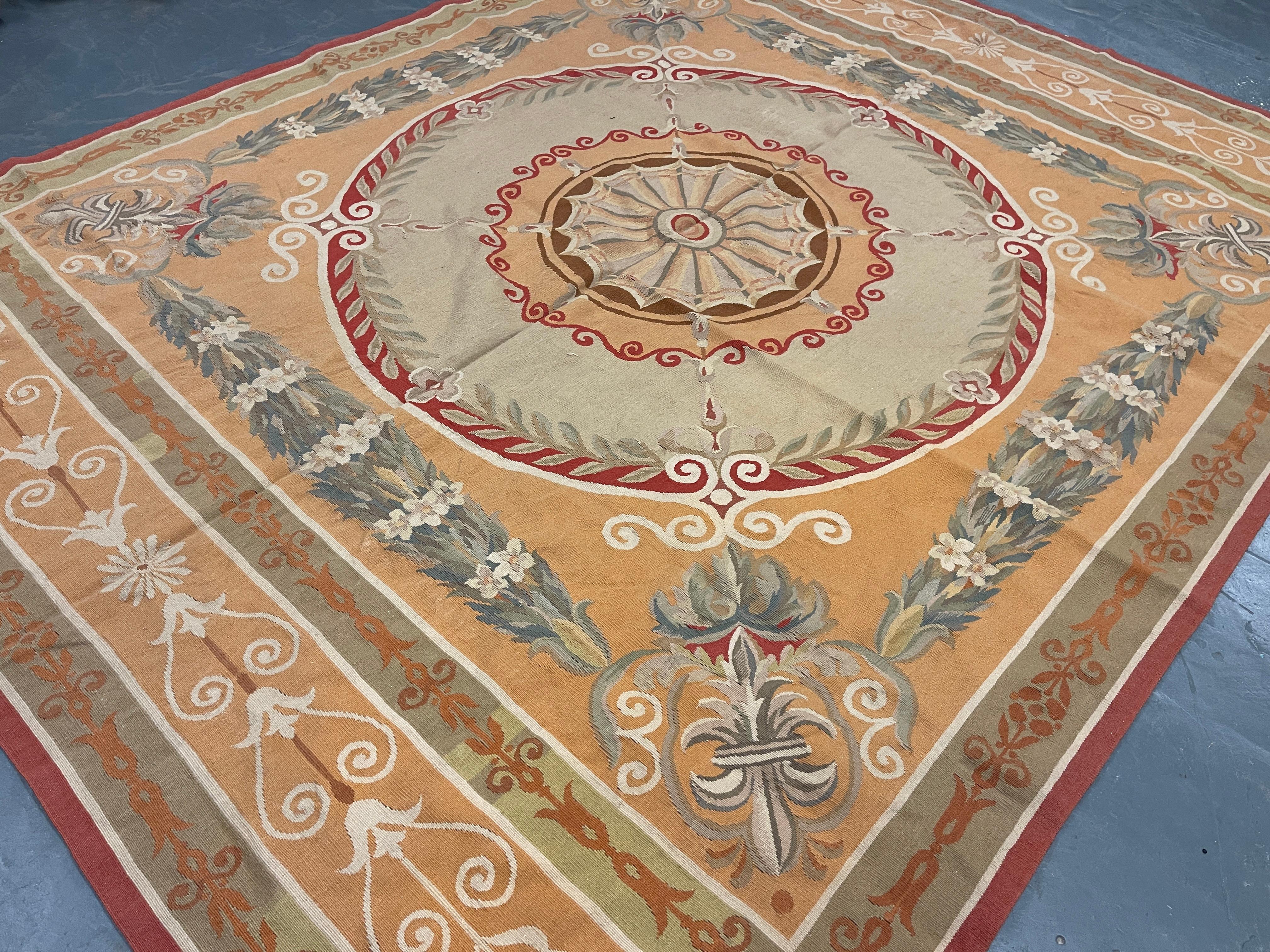 This fantastic area rug has been handwoven with a beautiful, symmetrical floral design woven on an ivory gold background with cream, green, red and ivory accents. This elegant piece's colour and design make it the perfect accent rug.
This style of