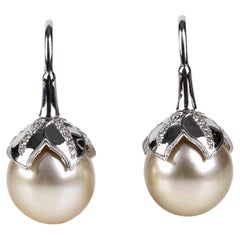 Boucles d'oreilles en or, perles d'Australie et diamants