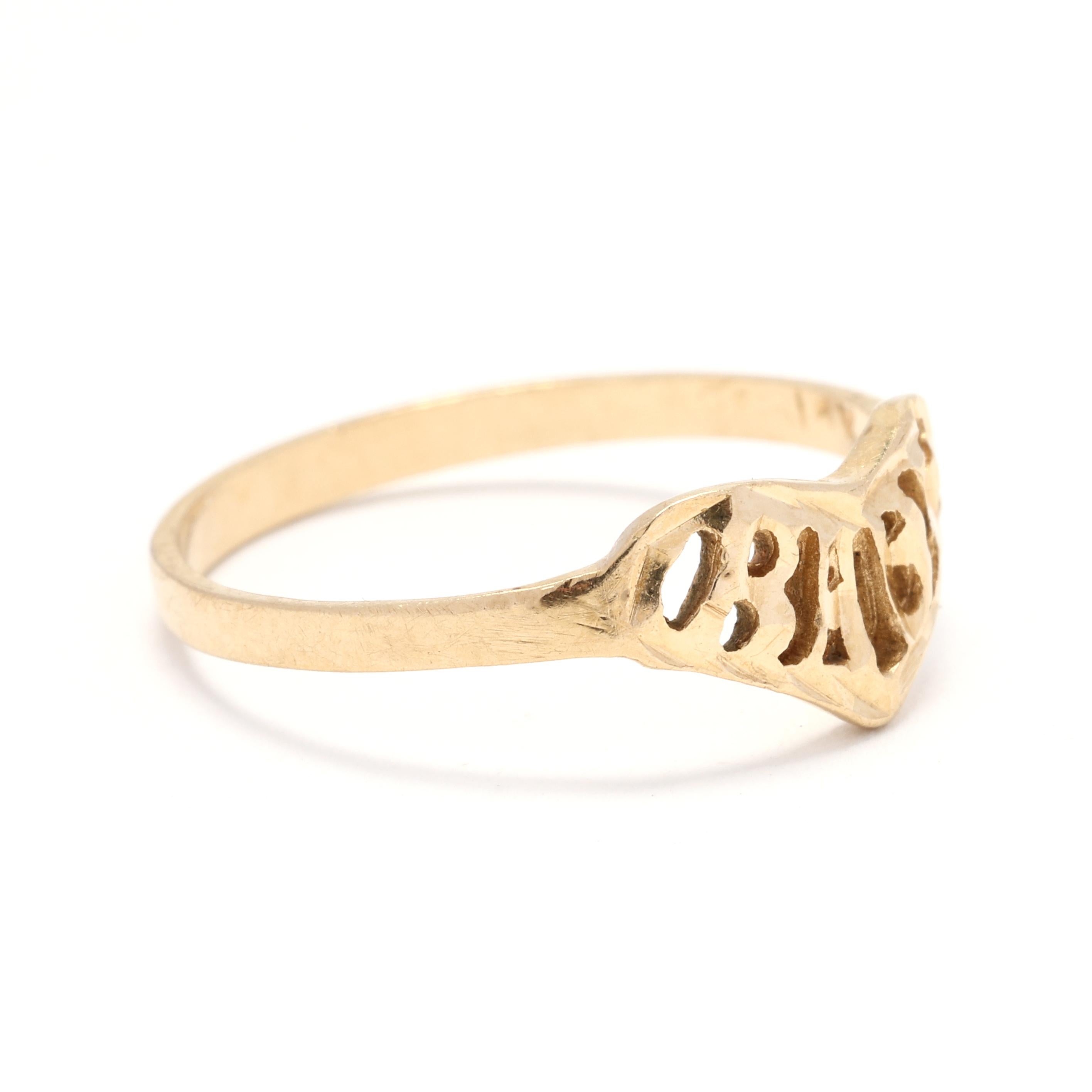 This stunning 14k yellow gold ring features a delicate script font, spelling out 