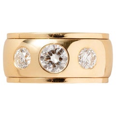 bague en or avec trois diamants