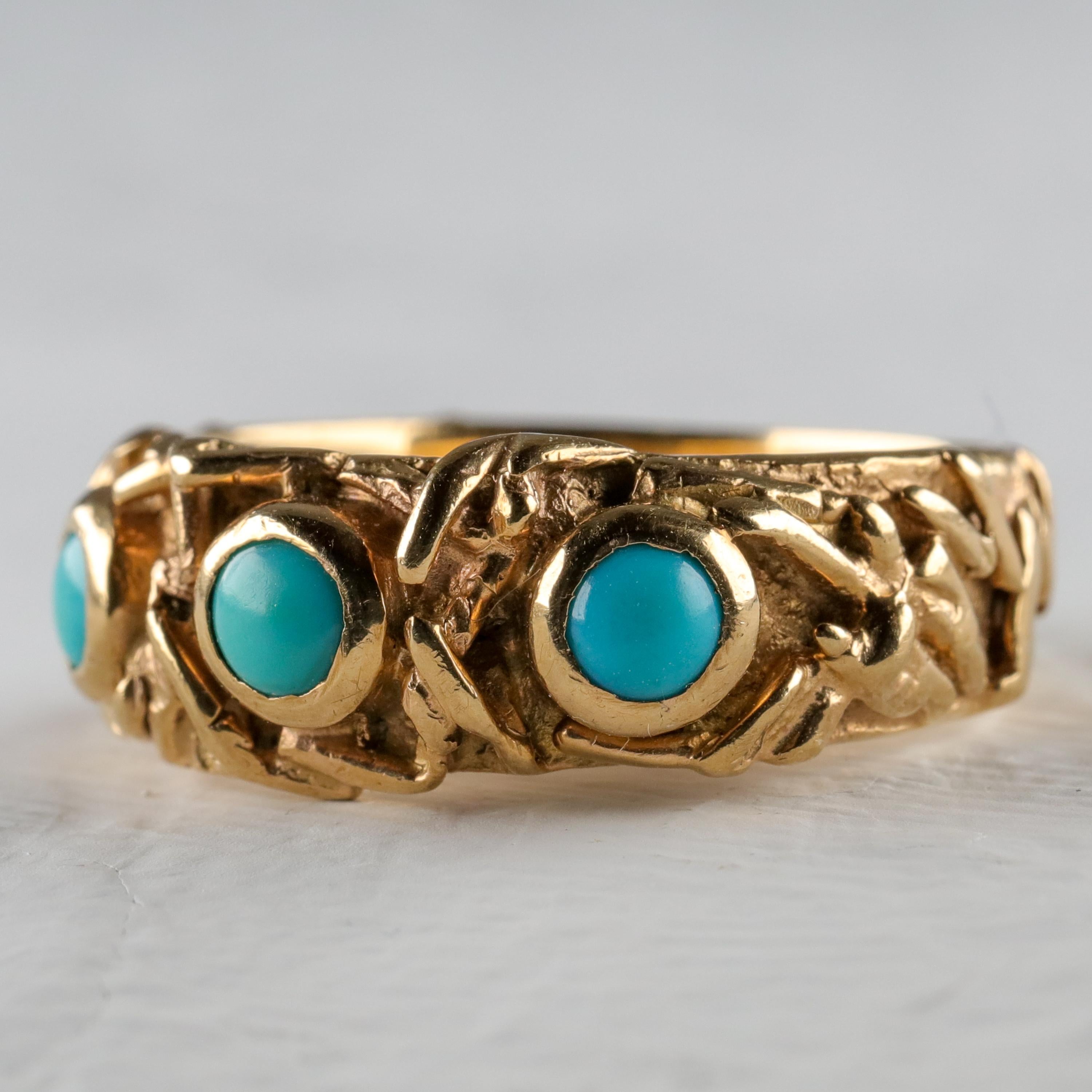 An exquisite, artistic heavy 18K solid buttery yellow gold band is bezel-set with three pristine natural Persian turquoise gems in this one-of-a-kind hand-crafted ring with a definitely Art Nouveau vibe that dates from the 1960s. Fully hallmarked on