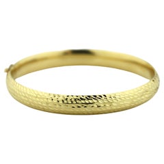 Pulsera brazalete de oro