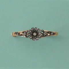 Gold Bangle with a Diamond Flower