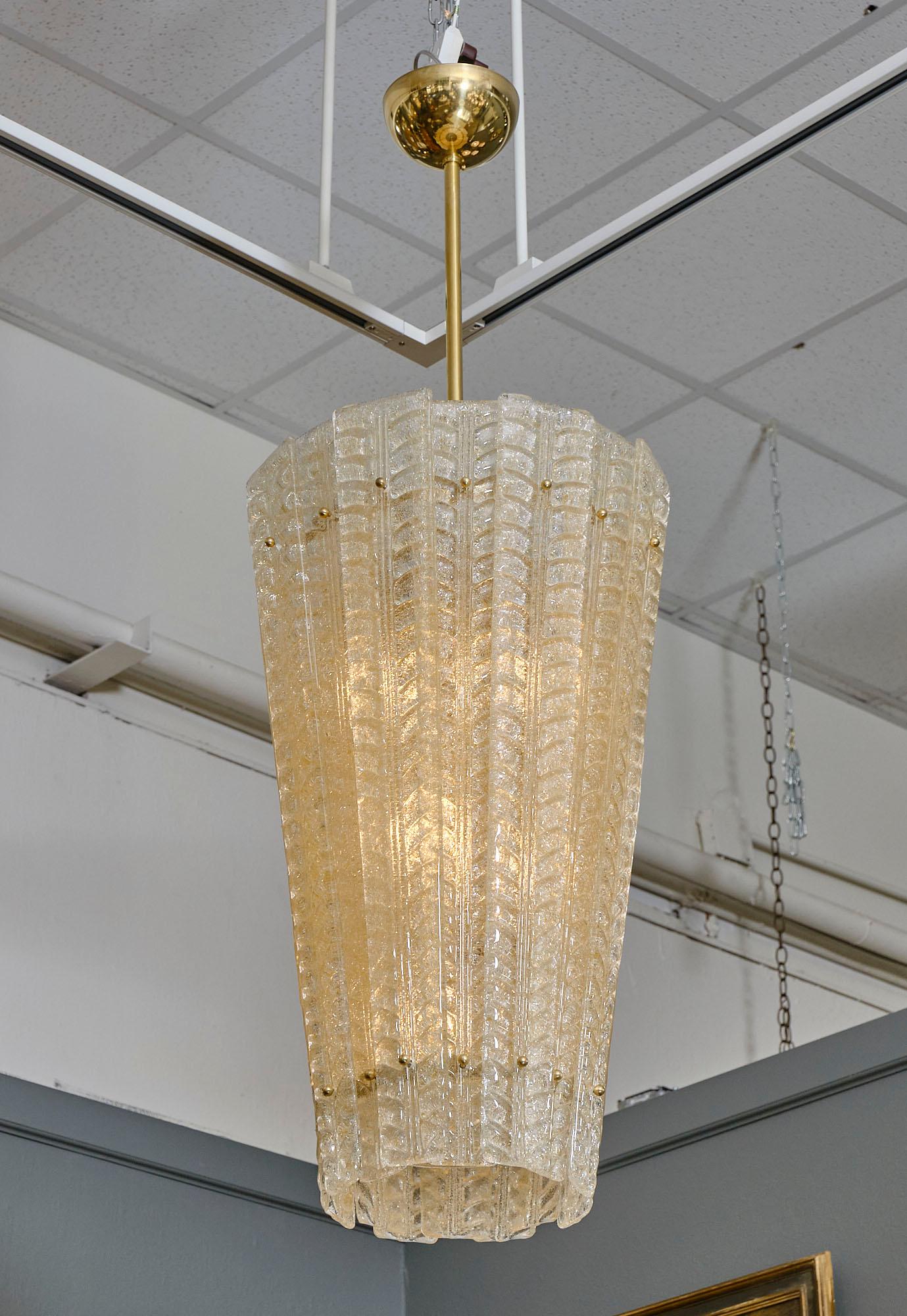 Lantern, Italian, from the Island of Murano. ”Pulegoso” glass blades are fused with 24 carat gold powder and attached to a gilt brass structure to form this stunning fixture.

This fixture is a special order from Italy. Please contact us for a lead