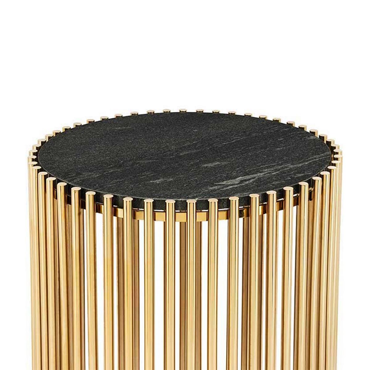 Side table gold bars black with steel structure
in gold finish and with black stone round top.
 
