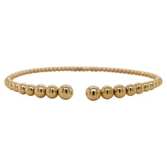 Bracelet manchette souple en or jaune 14 carats et perles BG4585