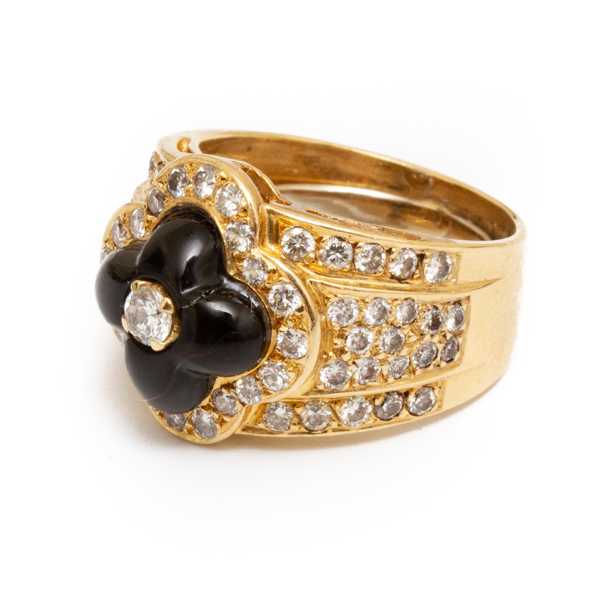 18k gold, diamond and black onyx ring with over 60 diamonds totaling approx. 1 carat approx. size 6 w/o guard and weighing a little under 5 DWT. From the Broussard estate noted jewelry collection Park Avenue New York