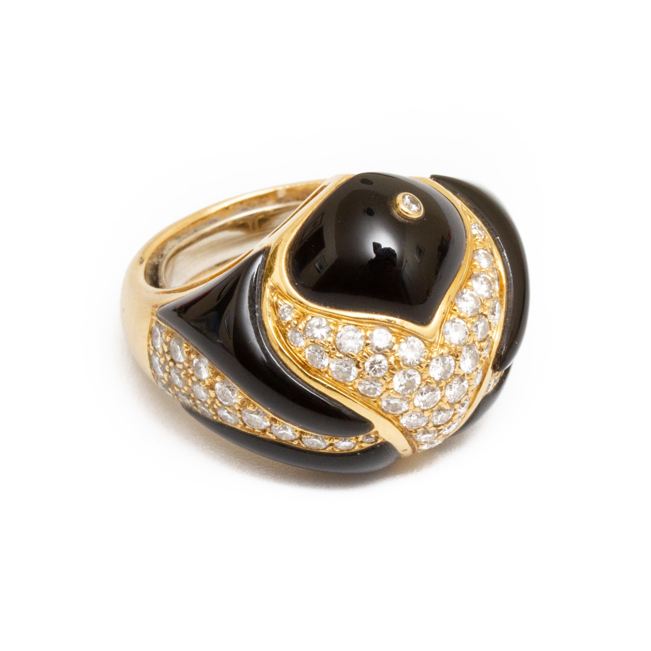 18k gold, diamond and carved black onyx ring with approx. 65 diamonds totaling approx. 1.25 cts approx. size 6 without ring guard and weighing approx. 6.5 dwt From the Broussard estate noted jewelry collection Park Avenue New York