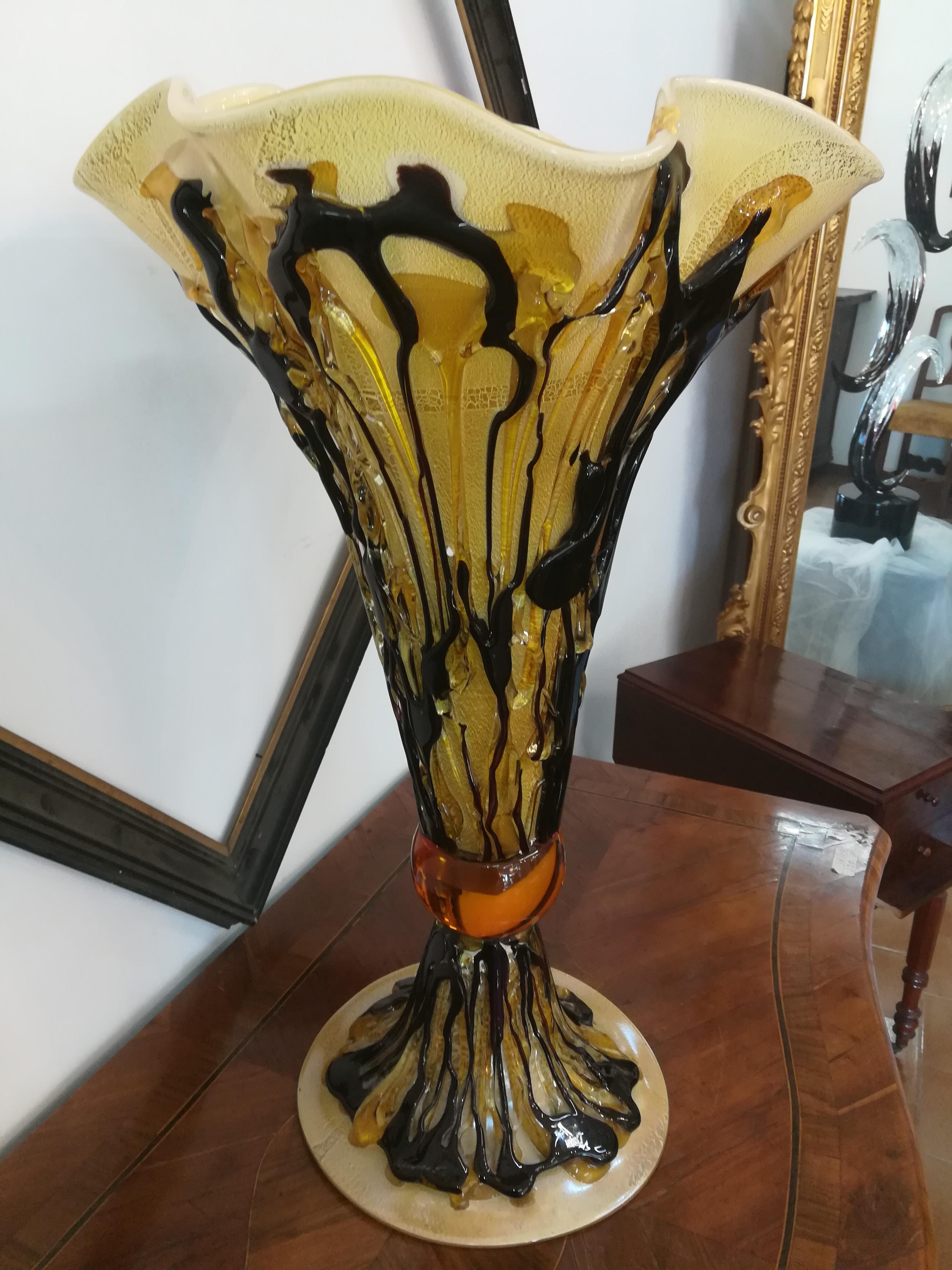 This is a modern glass blown coup. Handmade by the glassmaker Sergio Costantini.
These are three different pieces put together with hot glass.

    