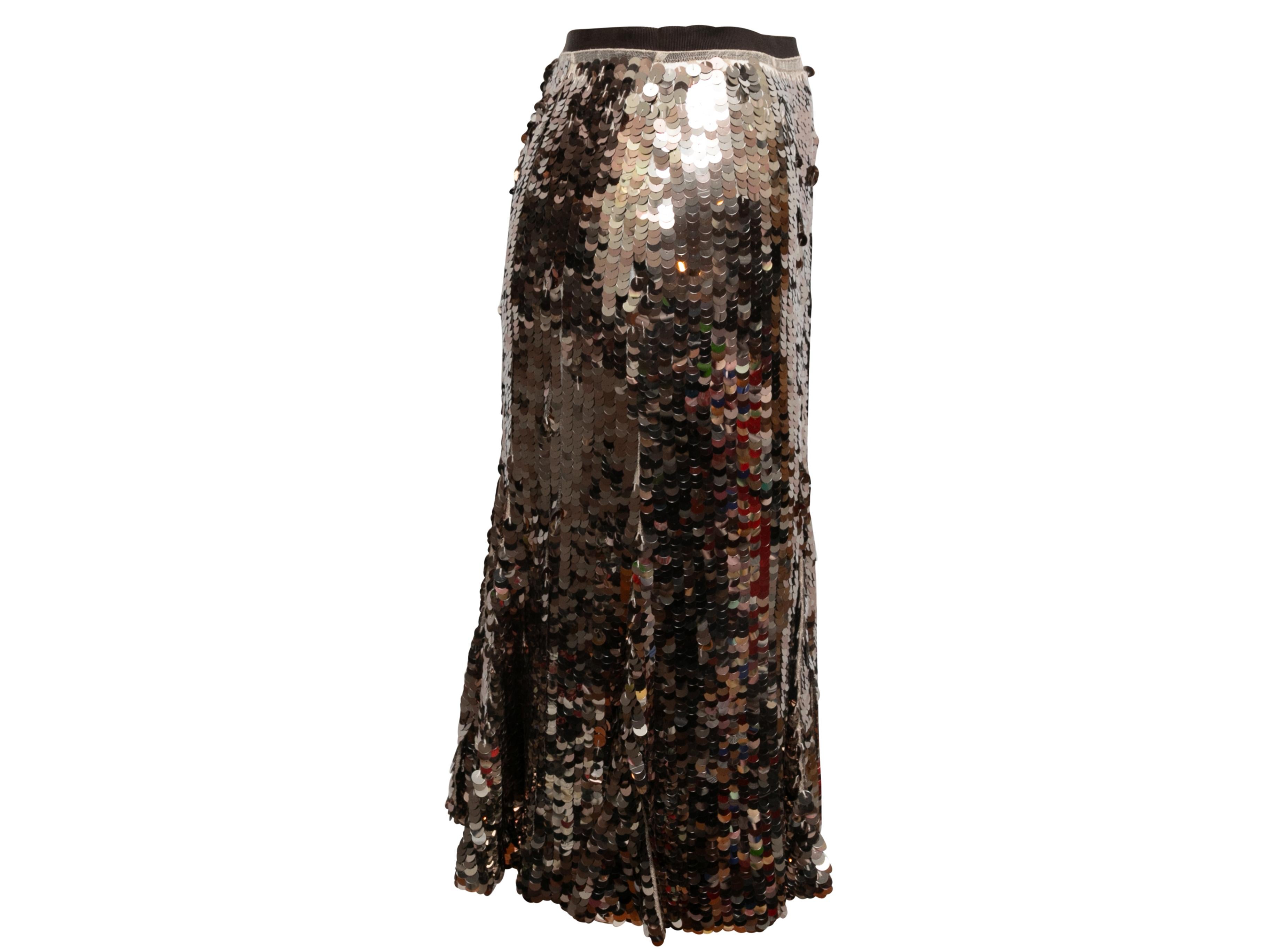  Gold and black silk knee-length sequined skirt by Prada. Side closure. 26