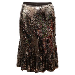 Jupe longueur genou en soie pailletée or et noire Prada Taille IT 40