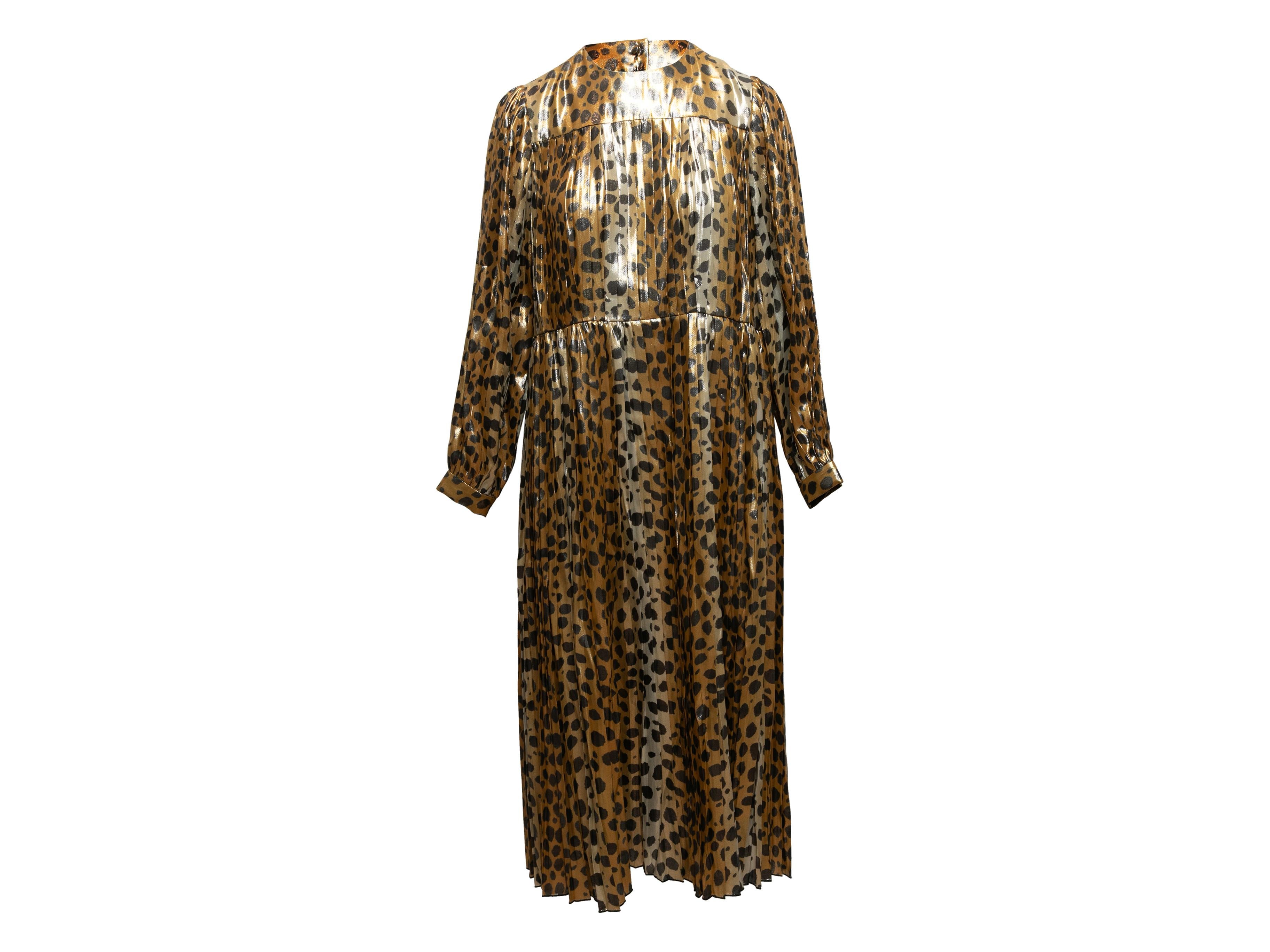 Gold and black silk cheetah print dress by Runway Marc Jacobs. Crew neck. Long sleeves. Sash tie at waist. Button closures at back. 39