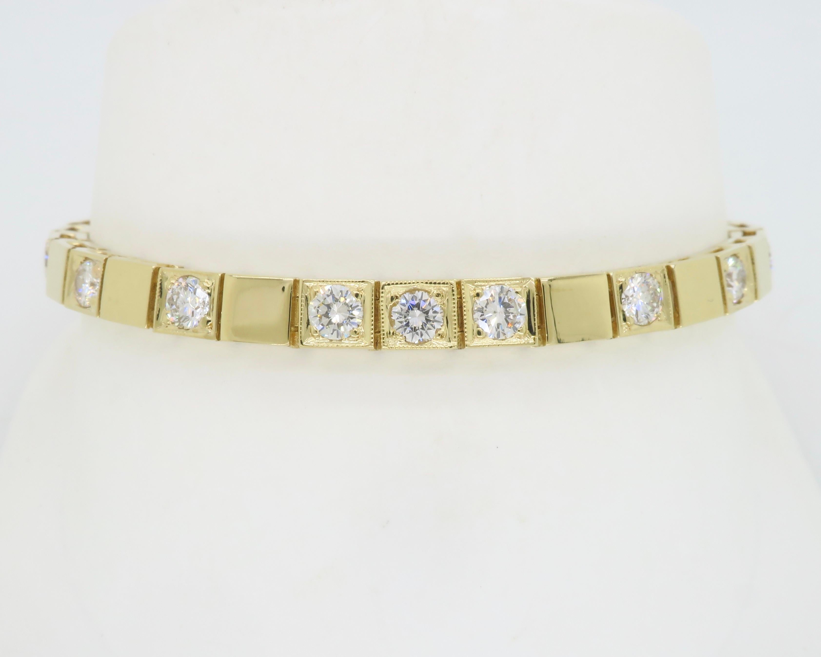 Alternating diamond and yellow gold block bracelet. 

Diamond Carat Weight: Approximately 3.20CTW
Diamond Cut: Round Brilliant Cut     
Color: Average: G-H
Clarity: Average: VS-SI
Metal: 14K Yellow Gold
Marked/Tested: Stamped 