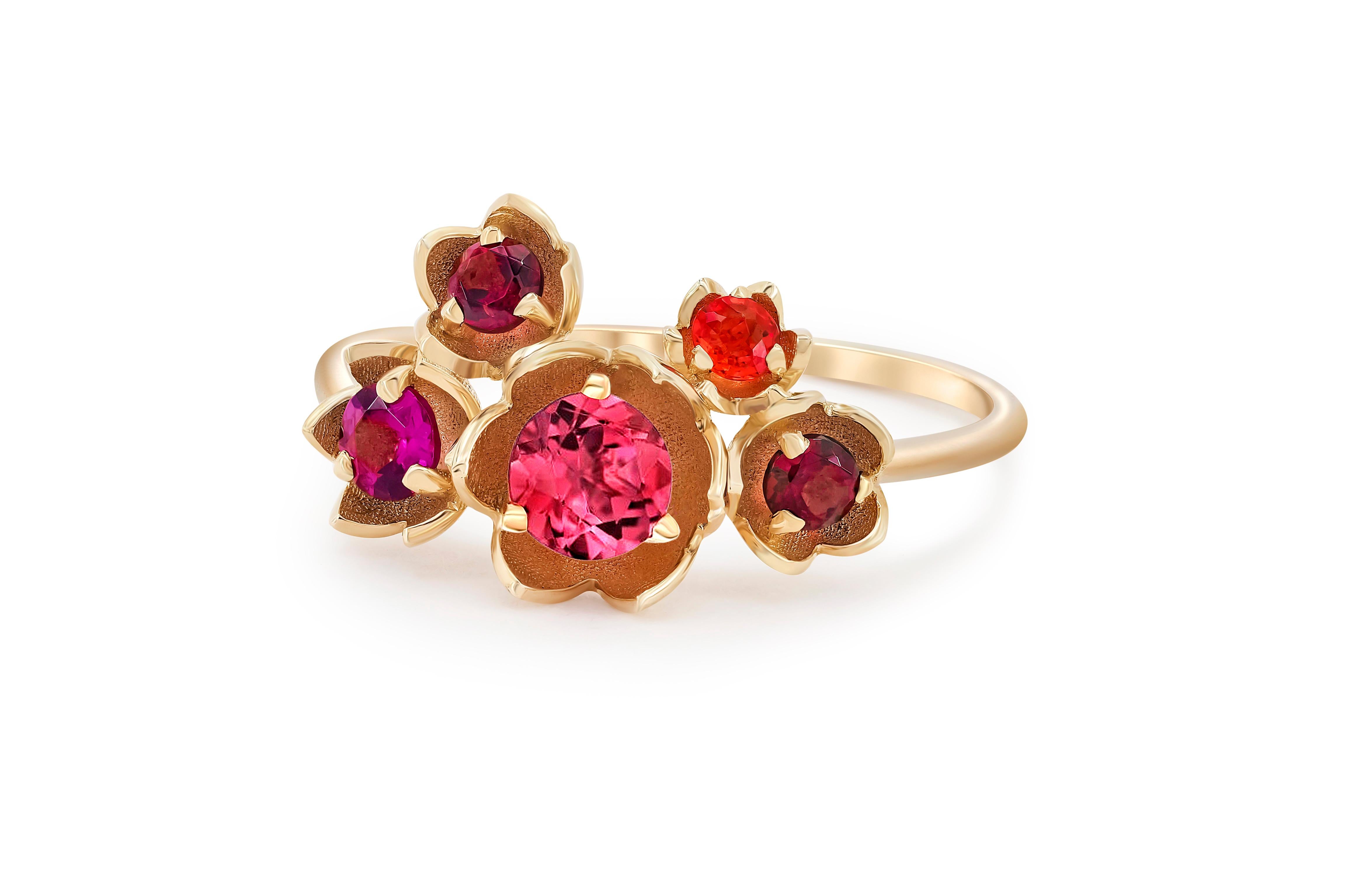 Gold blossom flower ring. 
Pink tourmaline ring in 14k gold. Pink gemstones ring. Flower bouquet ring. Tourmaline, sapphires, amethyst ring.

Weight: 1.8 g. depends from size
Gold: 14k gold.

Central stone: tourmaline
Cut: round
Weight: aprx 0.52