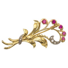 Gold bouquet of flowers brooch with synthetic rubies and diamonds