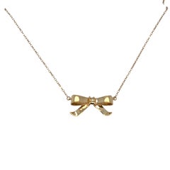 Collana con ciondolo a forma di fiocco in oro - Oro giallo 14k