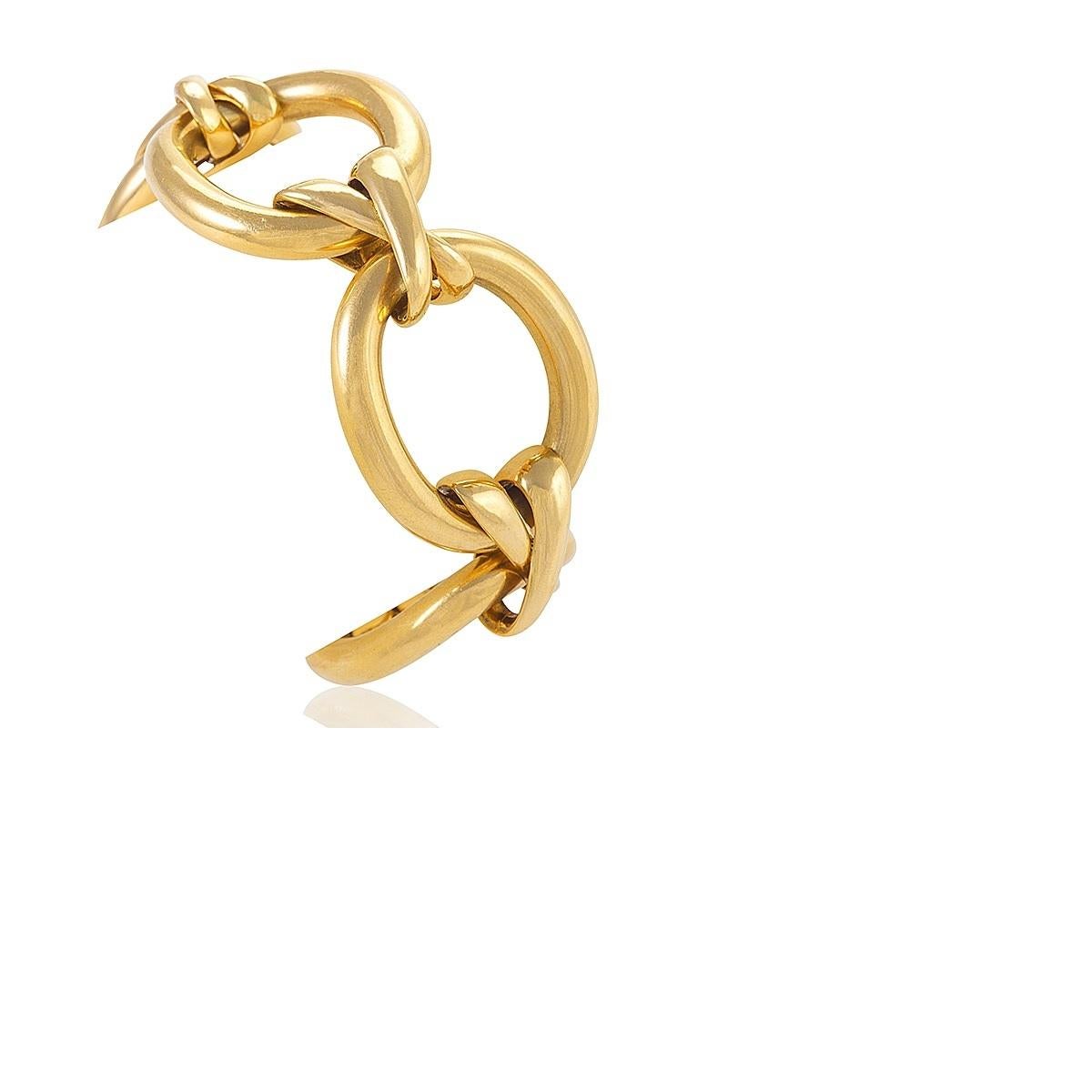 A French Late-20th Century 18 karat gold X-link bracelet by Paloma Picasso for Tiffany & Co. The bracelet is a beautiful example of the long-celebrated designer's hallmark simplistic elegance, featuring Tiffany's famed 