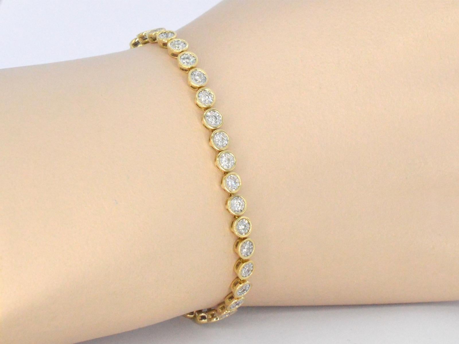 This 14K golden bracelet is an elegant piece of jewelry that exudes luxury and sophistication. It is adorned with brilliant cut diamonds that add a sparkling touch of glamour to its already stunning design. This bracelet is perfect for any special