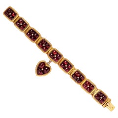 Gold bracelet with garnets and pearls