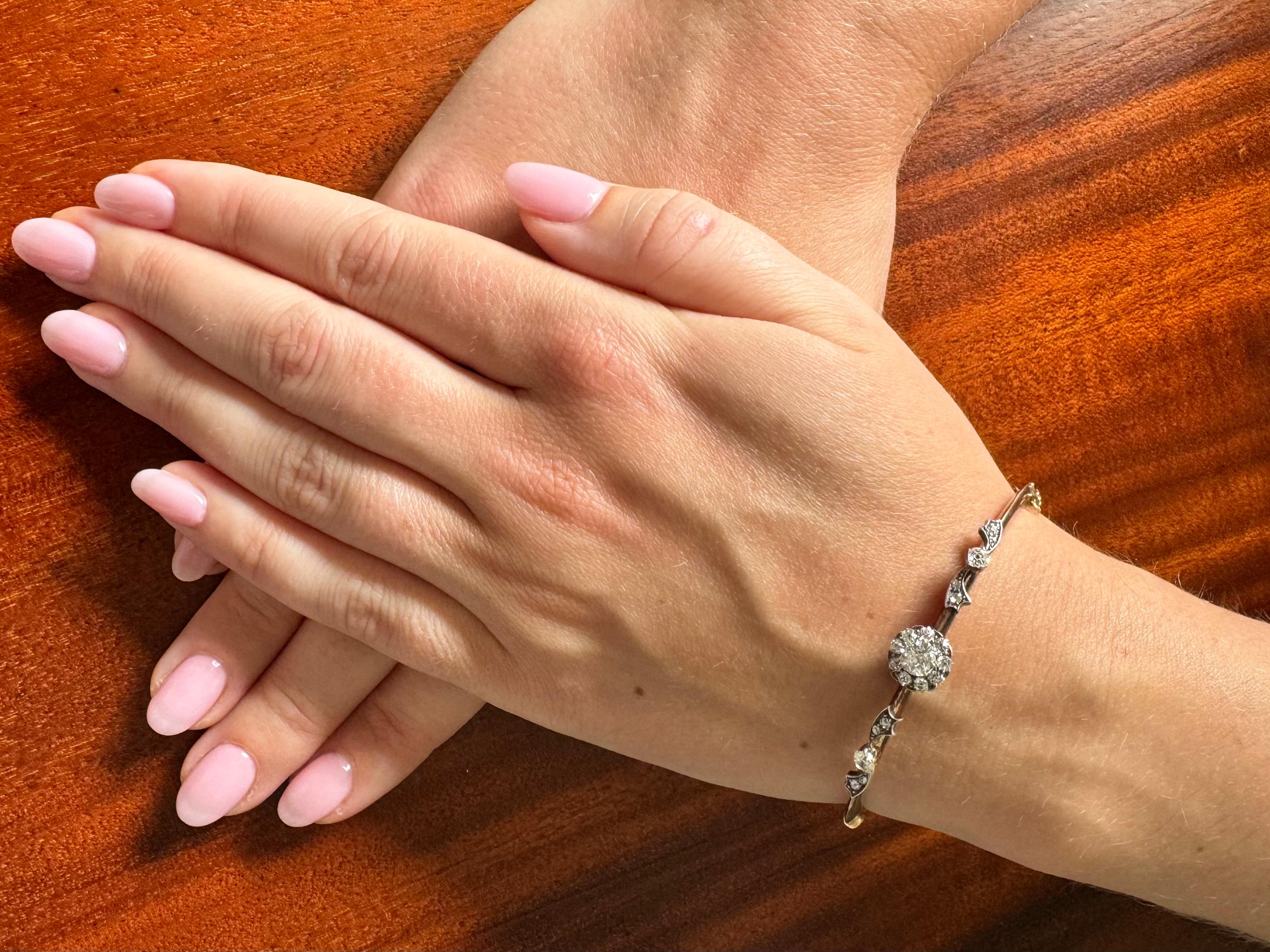 Bracelet made of 580 yellow gold and silver elements. Its central point is an old brilliant-cut diamond weighing 0.50ct (H color and SI1 purity). Additionally, 19 diamonds in the old cut 8/8 weighing 0.90 ct.

Elegant bracelet closed with a clasp