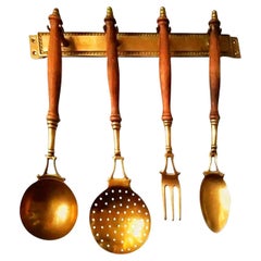 Antique Gold Brass and Wood Kitchen Utensils with from a Hanging Bar, Early 20th Century