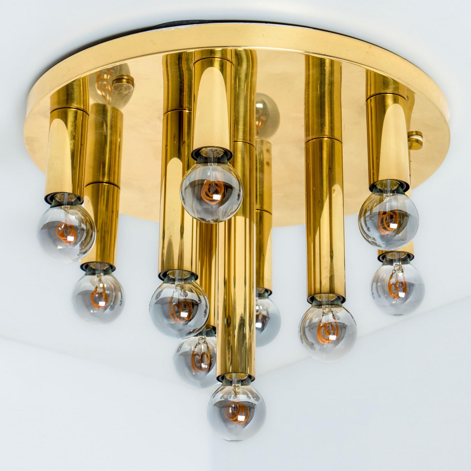 Beautiful brass Flush Mount by Cosack lights, Germany, 1960/1970.

Original 1960s space age brass ceiling light with nine lighting elements. This light was designed and produced by Cosack Lights, one of the premium light producer is the 1960s and