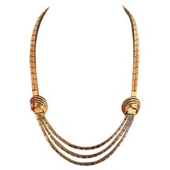 Collana di bricchette d'oro, tre ranghi, degli anni '60