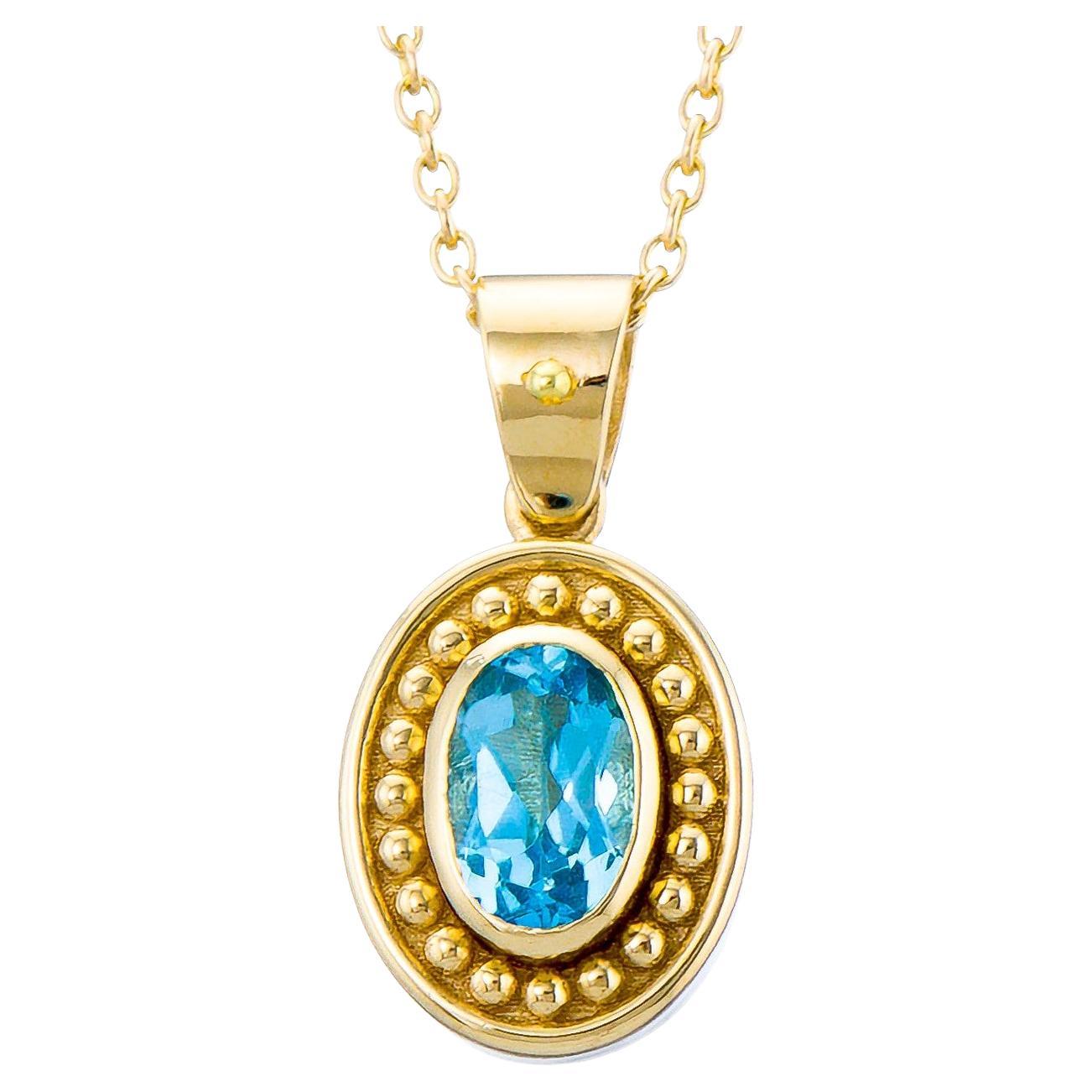 Gold Byzantine Pendant with Swiss Blue Topaz For Sale