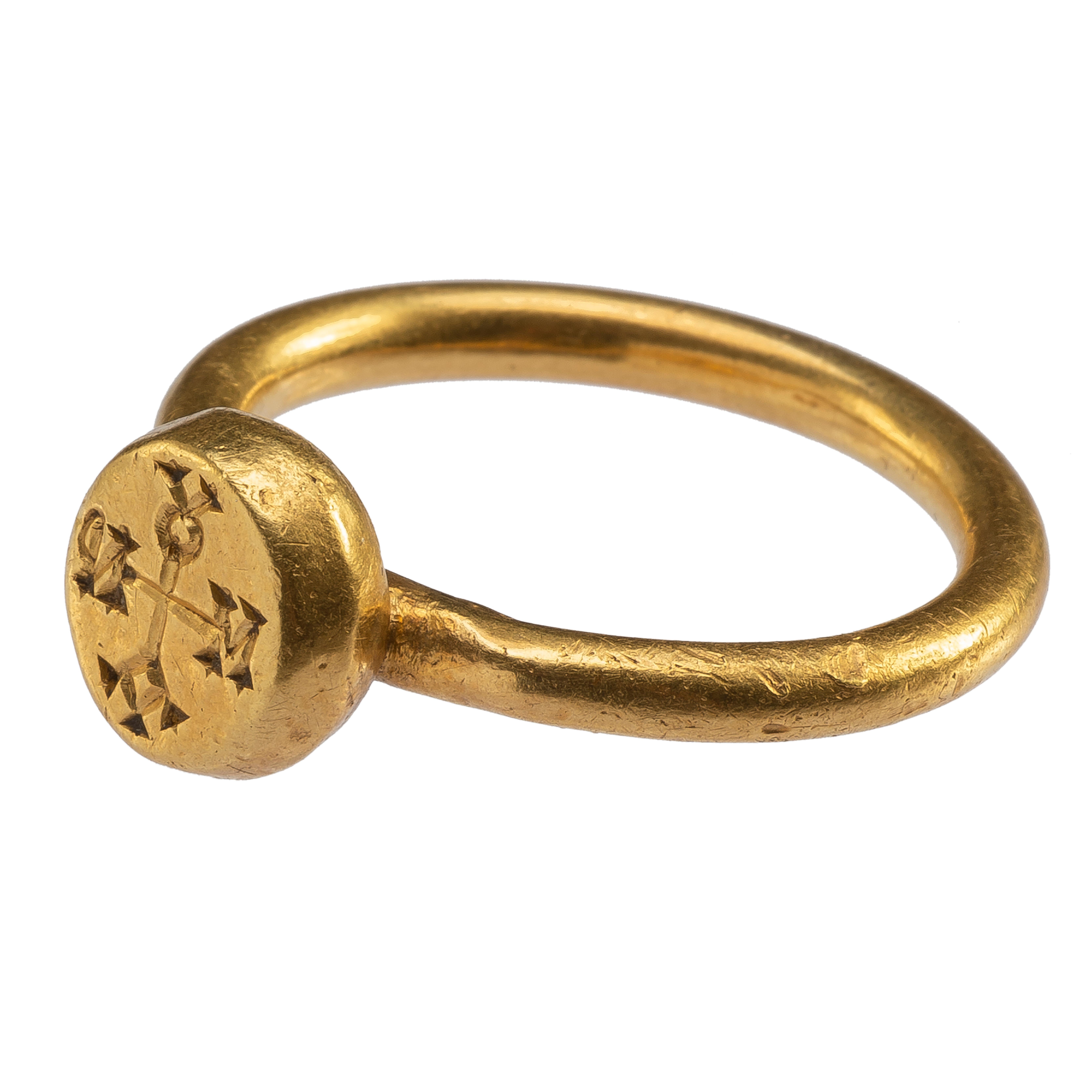 Byzantine Ring with Cruciform Monogram  
Early Byzantine,  mid-6th - 7th century  
Gold  
Weight 11.6 gr.; Circumference 60.38 mm.; US size 9 1/4; UK size S 1/4  

A gold ring with hoop in round section, which is slightly flattened on top to support