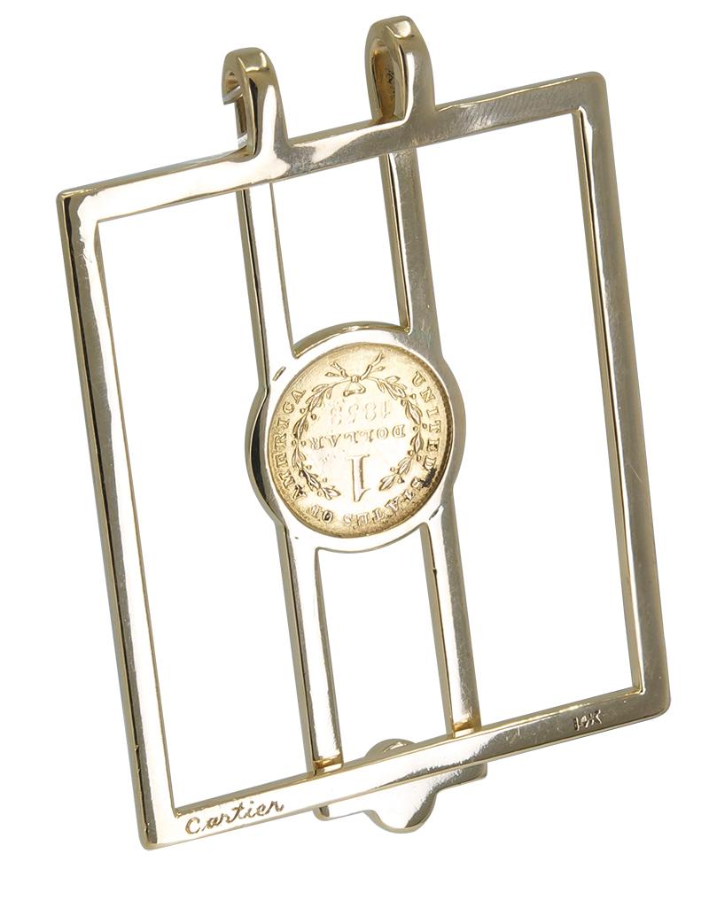 Handsome and unusual money clip.  Made and signed by CARTIER.  The front clip has a bezel-set 