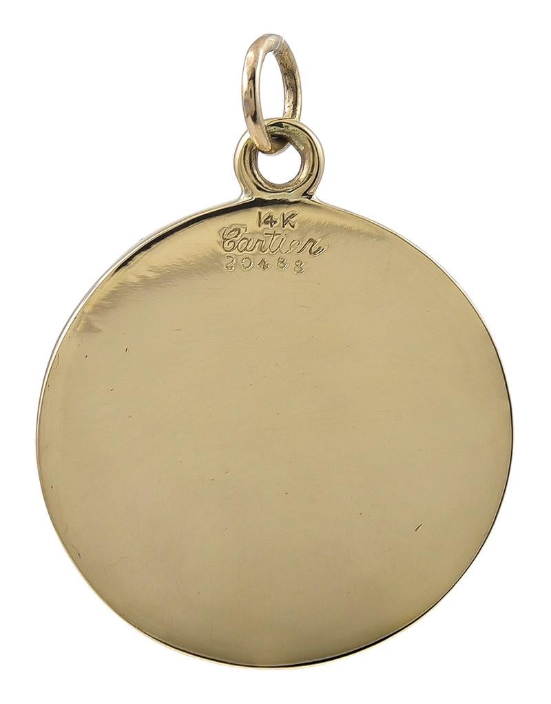Large St. Christopher's medal.  Made, signed and numbered by CARTIER. 14K yellow gold.  1 1/4
